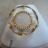 Bague ronde blanche et dor�e.