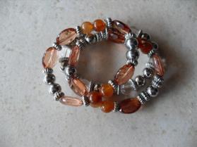 Bracelet 3 rangs perles marron-m�tal.