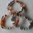 Bracelet 3 rangs perles marron-m�tal.
