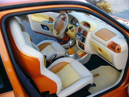 http://s3.e-monsite.com/2010/12/01/11/resize_550_550//interieur-tuning-clio-2.jpg